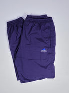 Adidas purple track pants with white logo